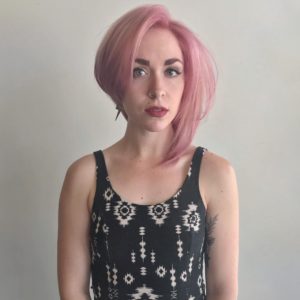 Asymmetric Blowout Bob with Messy Straight Texture and Pink Pastel Hair Color Short Hairstyle