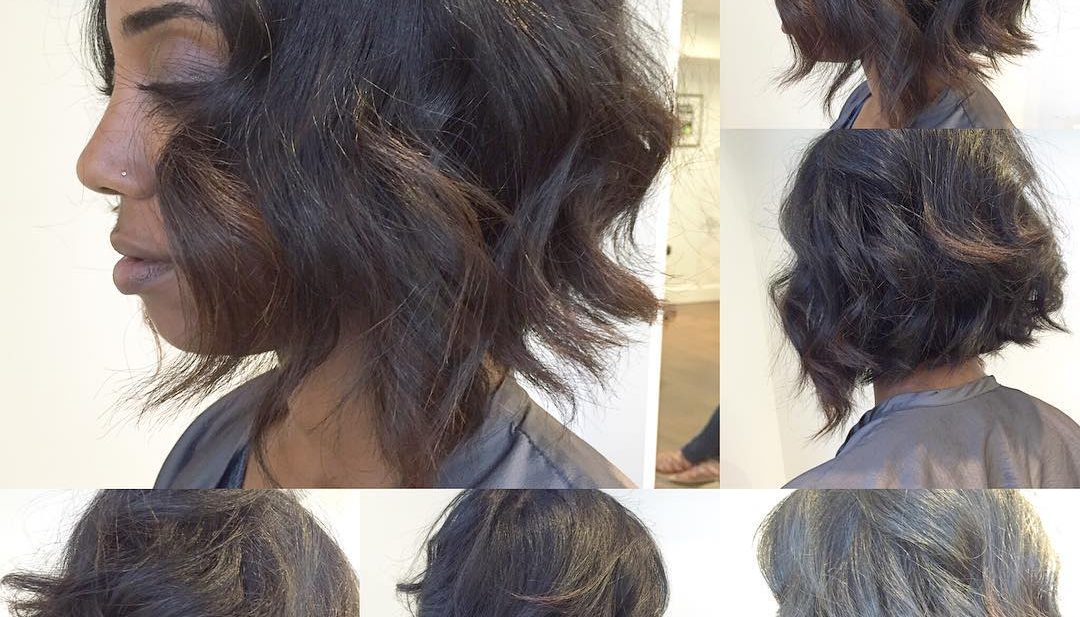 Black Angled Bob with Textured Waves and Brunette Highlights Short Hairstyle