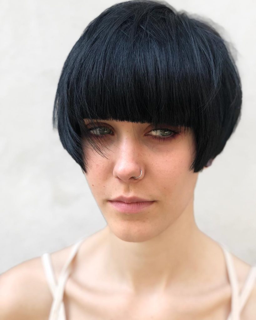 Black Modern Geometric Pixie with Full Blunt Bangs and Bevelled Straight Texture Short Chic Retro Hairstyle