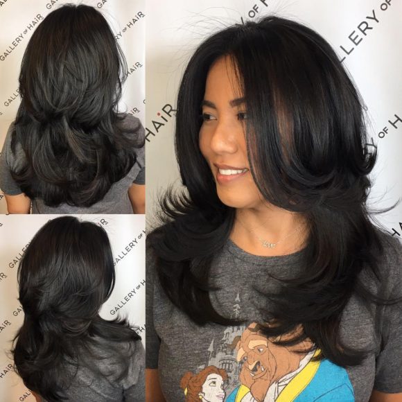 Black Shaggy Razor Cut with Long Layers and Flipped Ends