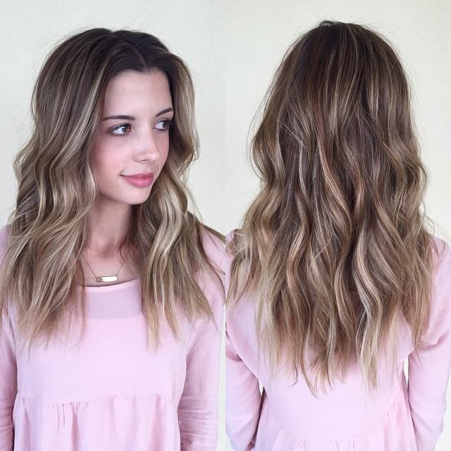 Blonde Balayage Layered Cut with Textured Waves and Center Part Long Hairstyle