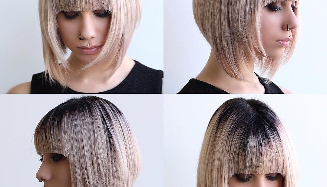 Blonde Razor Cut Angled Bob with Full Blunt Bangs and Black Shadow Roots Medium Length Hairstyle