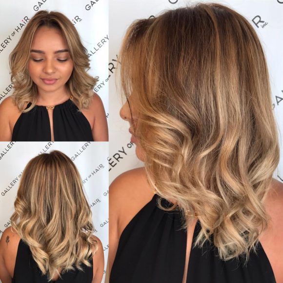 Blonde Sun Kissed Layered Cut with Large Soft Waves and Parted Face Framing Layers