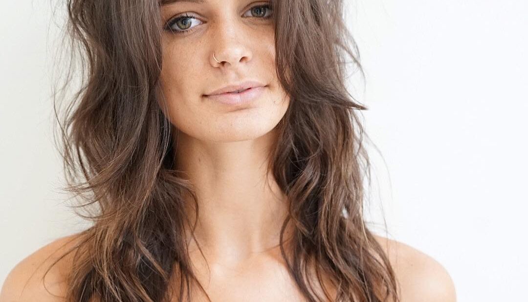 Boho Chic Shag with Long Curtain Bangs and Messy Beach Wavy Texture on Brown Hair Long Summer Hairstyle