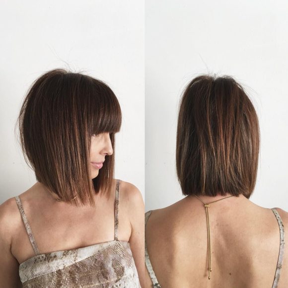Brunette Bob with Full Blunt Bangs and Undone Straight Texture Medium Length Hairstyle