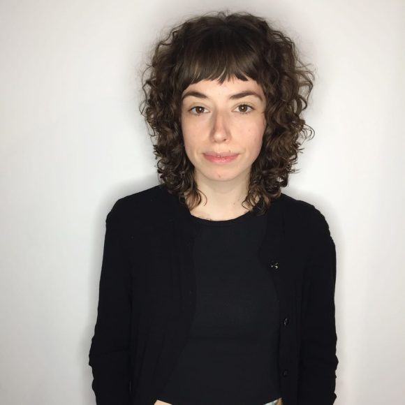 Brunette Mod Fringe Cut with Curly Texture and Fringe Bangs