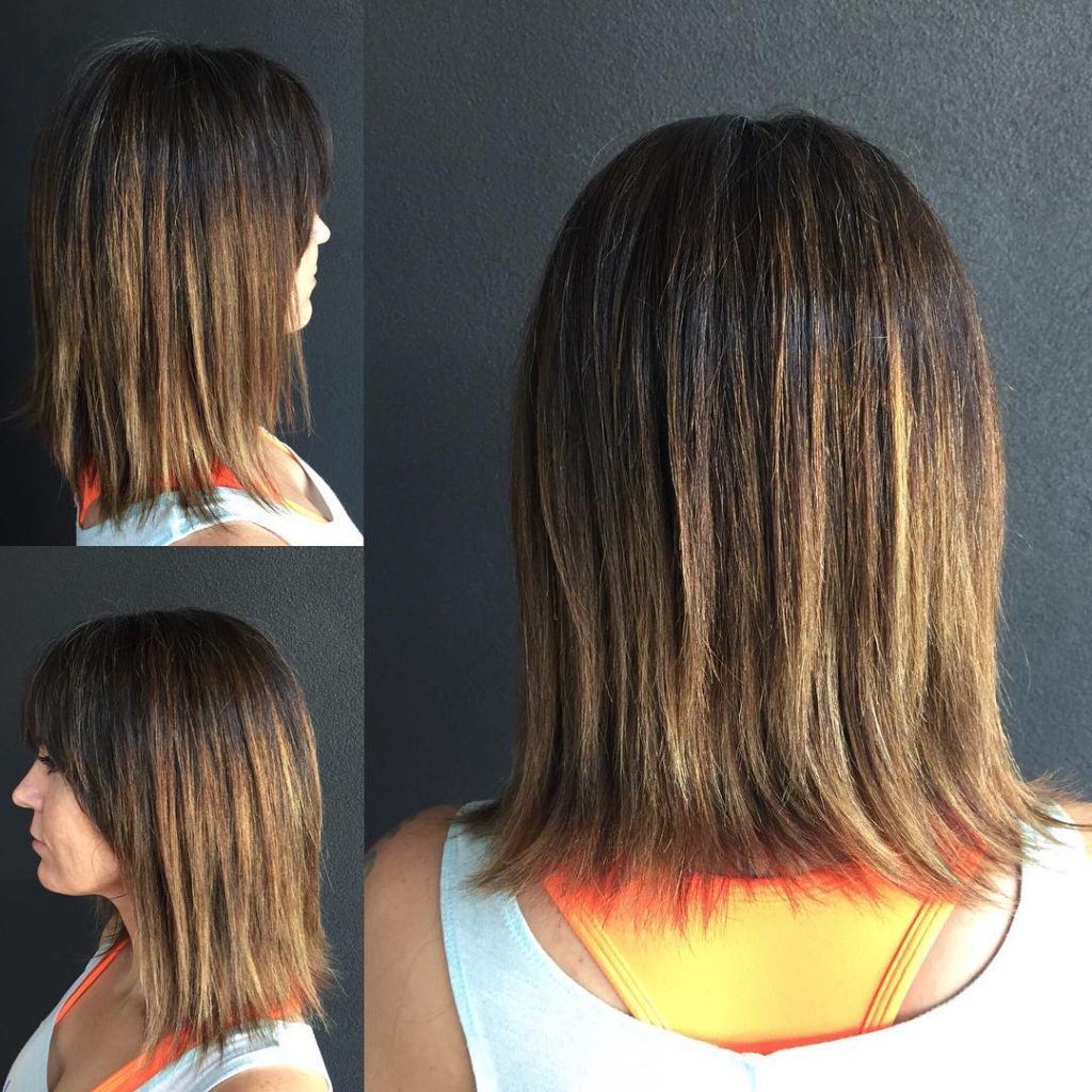 Textured Razor Cut Bob with Brow Skimming Bangs and Brunette Ombre Coloring Medium Length Hairstyle