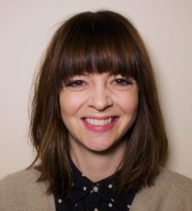 Brunette Textured Lob with Seamless Layers and Fringe Bangs Medium Length Hairstyle