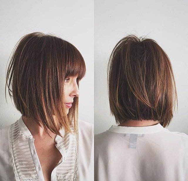 Chic Razor Cut Bob with Bangs and Undone Straight Texture with Warm Brown Color Medium Length Hairstyle