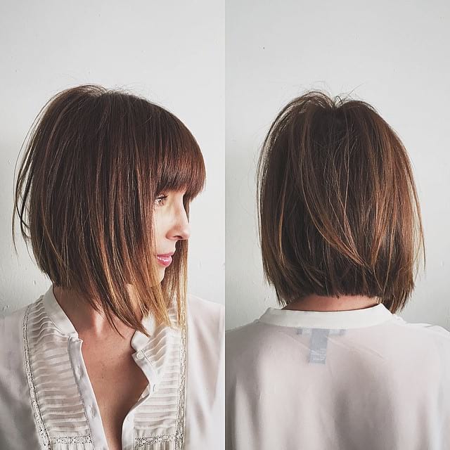 Chic Razor Cut Bob with Bangs and Undone Straight Texture with Warm Brown Color Medium Length Hairstyle