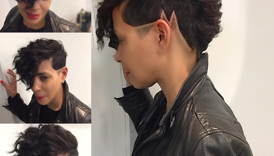 Chic Wavy Faux Hawk with Shaved Line Art and Fade Short Hairstyle