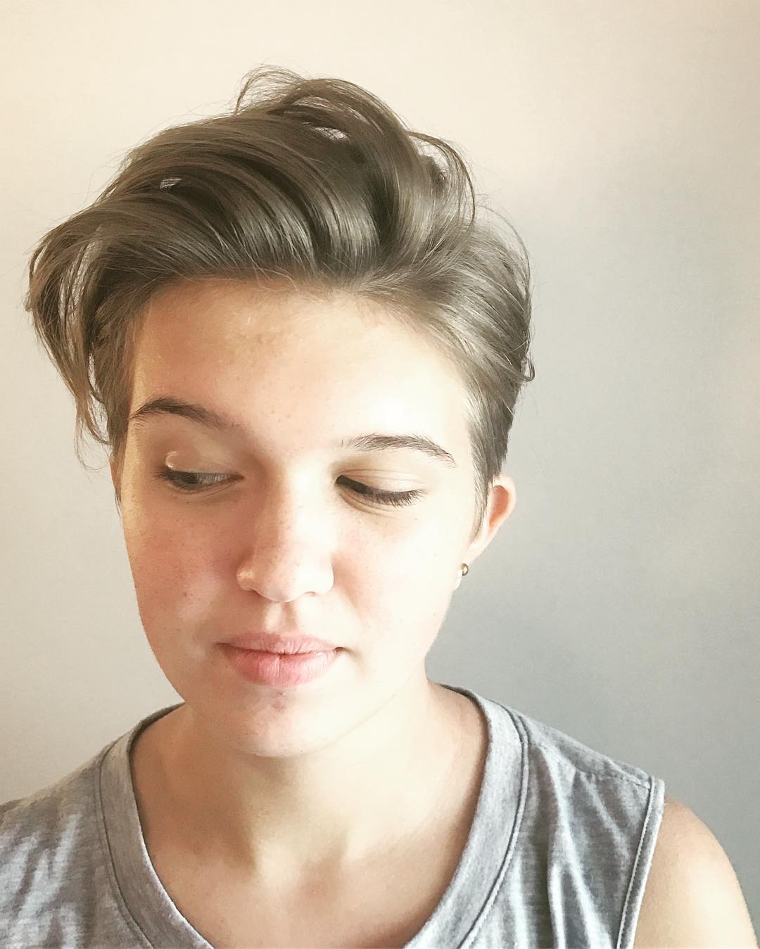 Cool Undercut Pixie With Brushed Up Messy Straight Texture And