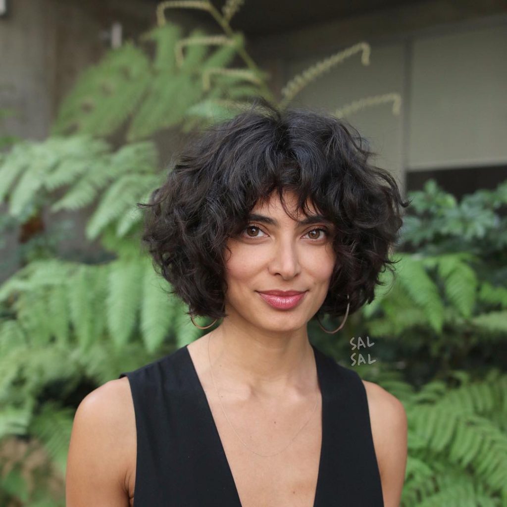 Dark Brunette Layered Bob with Undone Natural Curls and Fringed Bangs Short Hairstyle