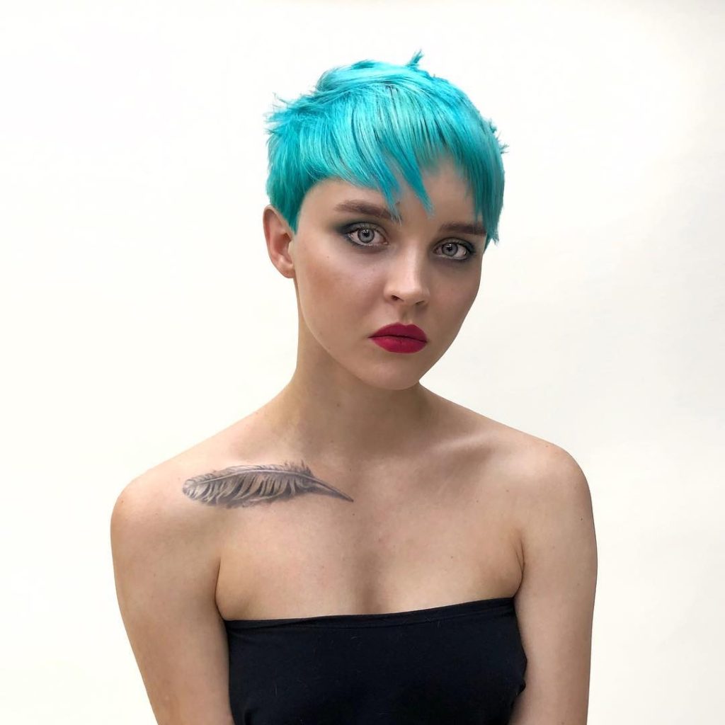 Eccentric Choppy Pixie with Messy Texture and Bright Turquoise Blue Hair Color Short Fall Hairstyle