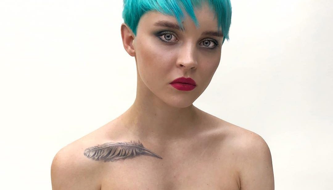 Eccentric Choppy Pixie with Messy Texture and Bright Turquoise Blue Hair Color Short Fall Hairstyle