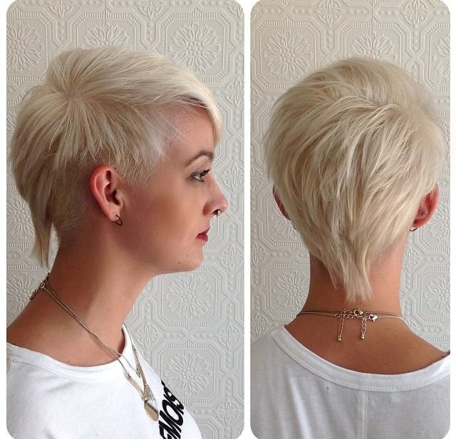 Edgy Platinum Textured Mullet with Tapered Sides and Side Swept Bangs Short Hairstyle