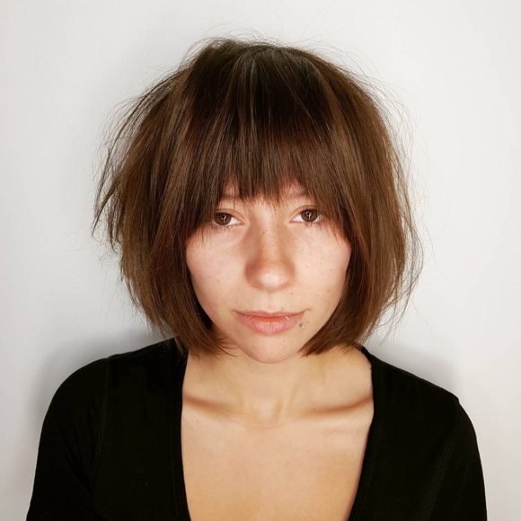 Golden Brown Shaggy Bob with Straight Undone Texture and Fringe Bangs