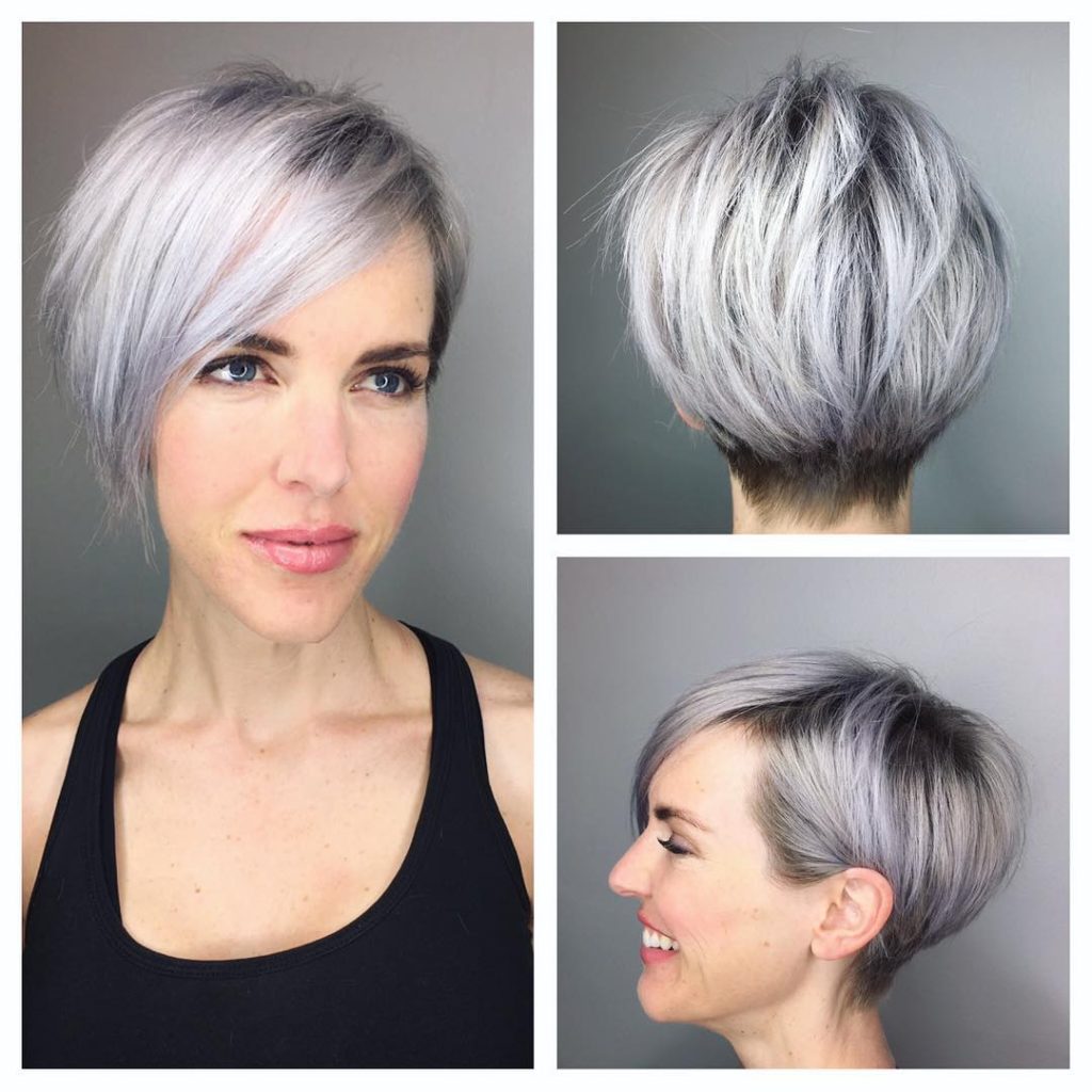 Graduated Silver Textured Pixie with Side Swept Bangs and Shadow Roots Short Hairstyle