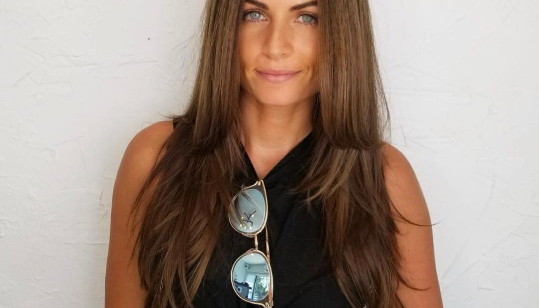 Layered Cut with Straight Wind Blown Beachy Texture and Deep Bronzed Brown Hair Color Long Summer Hairstyle