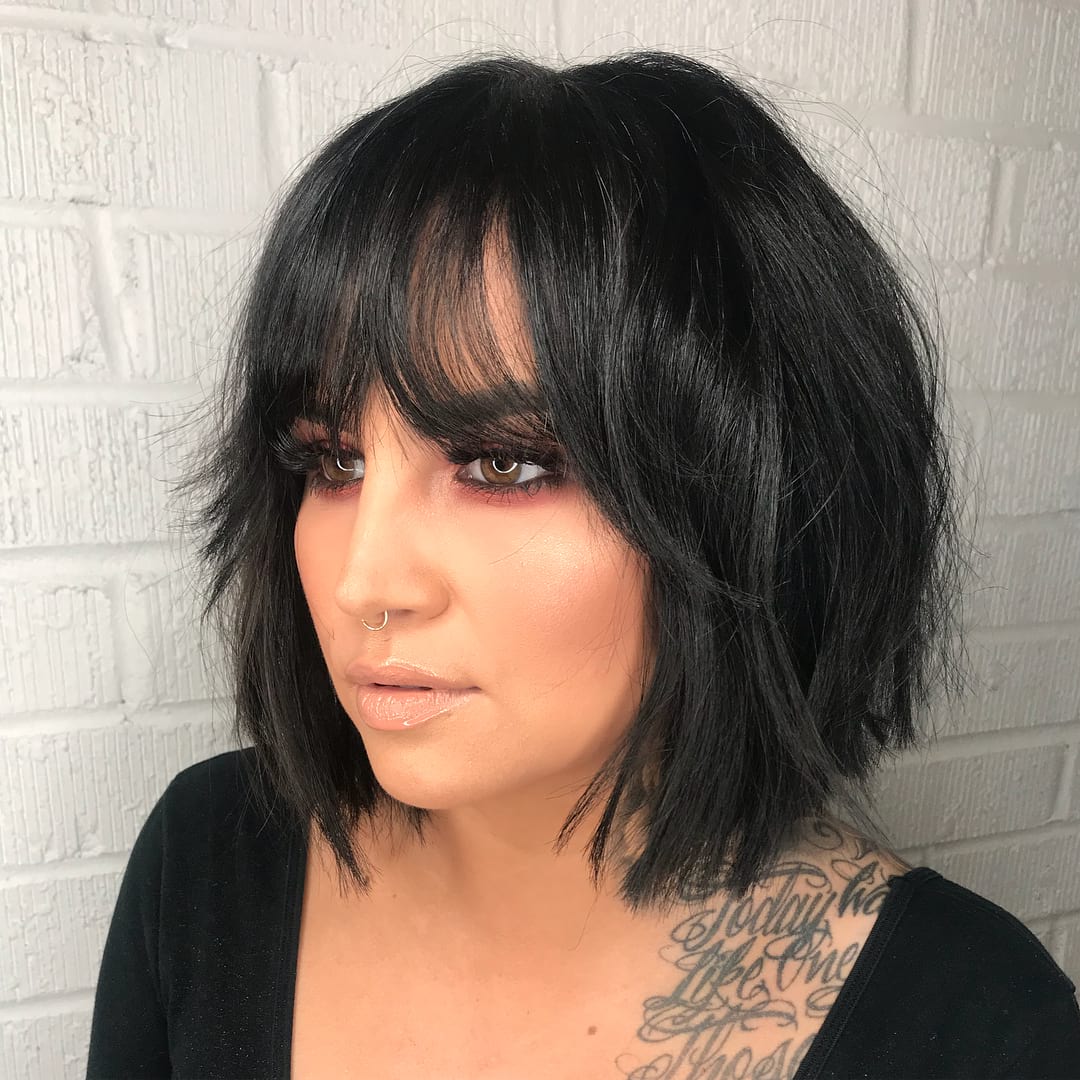 Layered Modern French Bob With Face Framing Fringe Bangs And Messy Just A Bend Texture On Black Hair The Latest Hairstyles For Men And Women 2020 Hairstyleology