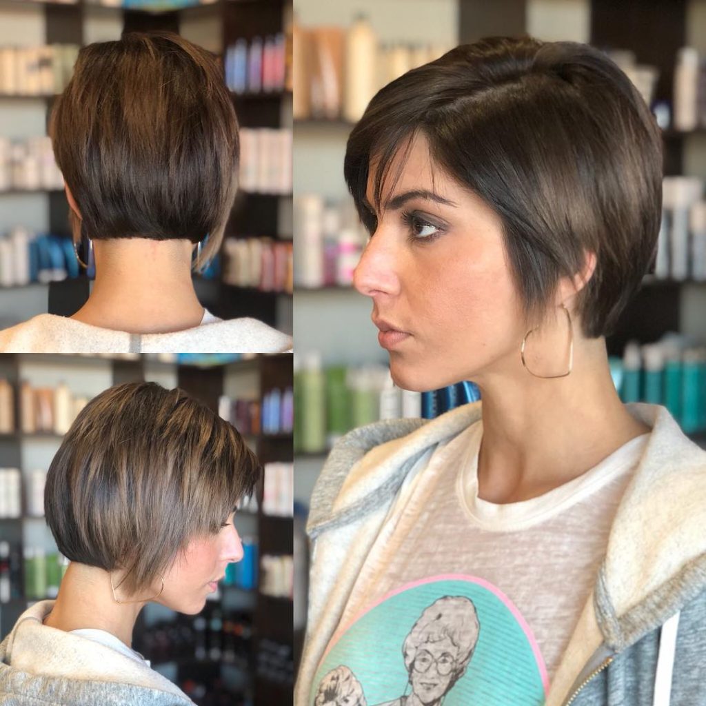 Layered Razor Cut Pixie with Straight Texture and Side Swept Bangs on Brunette Hair Short Fall Hairstyle