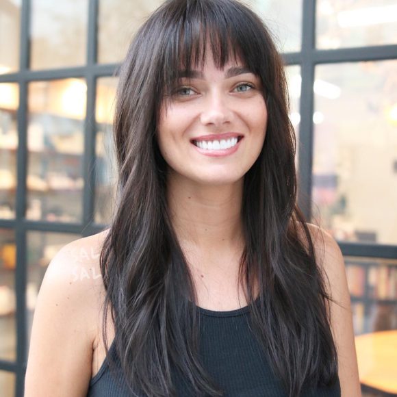 Long Brunette Fringe Cut with Bangs and Soft Messy Waves