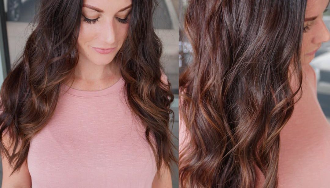 Long Brunette Wavy Layered Cut with Warm Toned Highlights Long Hairstyle