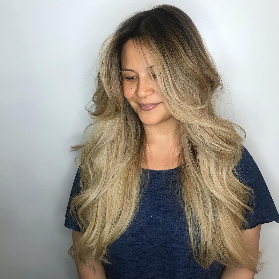 Long Curtained Layered Cut with Wavy Bombshell Blowout and Dark Blonde  long-curtained-layered-cut-with-wavy-bombshell-blowout-and-dark-blonde