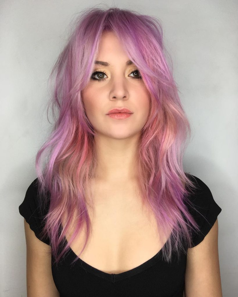 Long Pink Shag Cut with Messy Wavy Texture and Curtain Bangs Long Fall Hairstyle