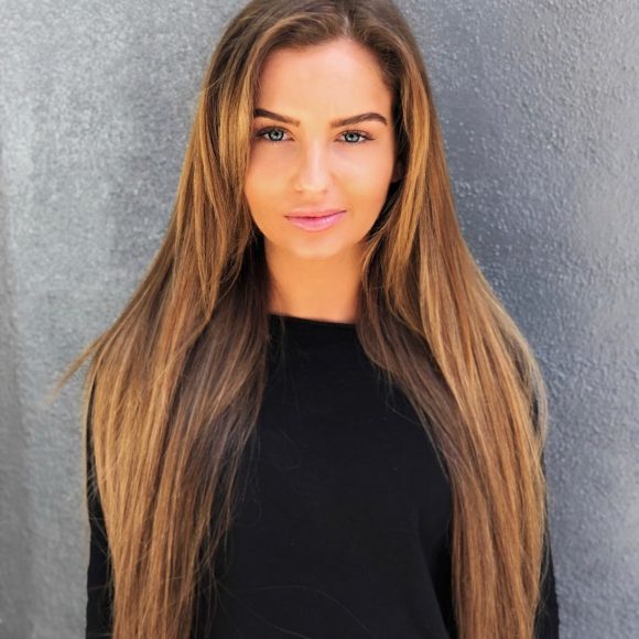 Soft Layered Cut with Straight Blowout Texture and Extensions on Honey Brown Balayage Colored Hair