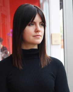 Long Straight Textured Square Lob with Curtain Bangs and Warm Brunette Hair Painting Medium Length Fall Hairstyle