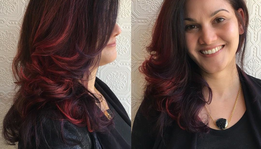 Longhair with Curled Blowout and Red Balayage Highlights
