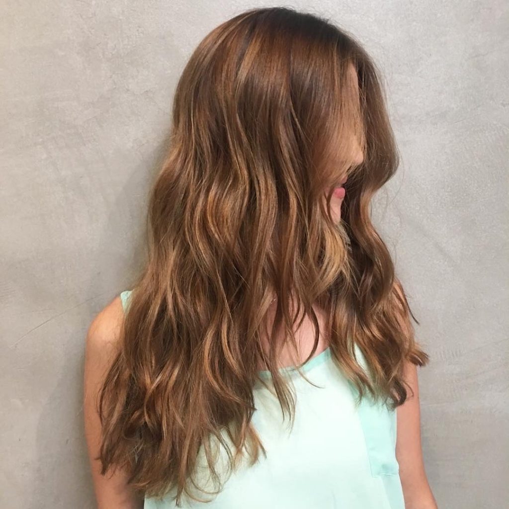 Long Wavy V Cut Layers On Warm Light Brown Hair The Latest Hairstyles  Long Wavy V Cut Layers On Warm Light Brown Hair The Latest Hairstyles