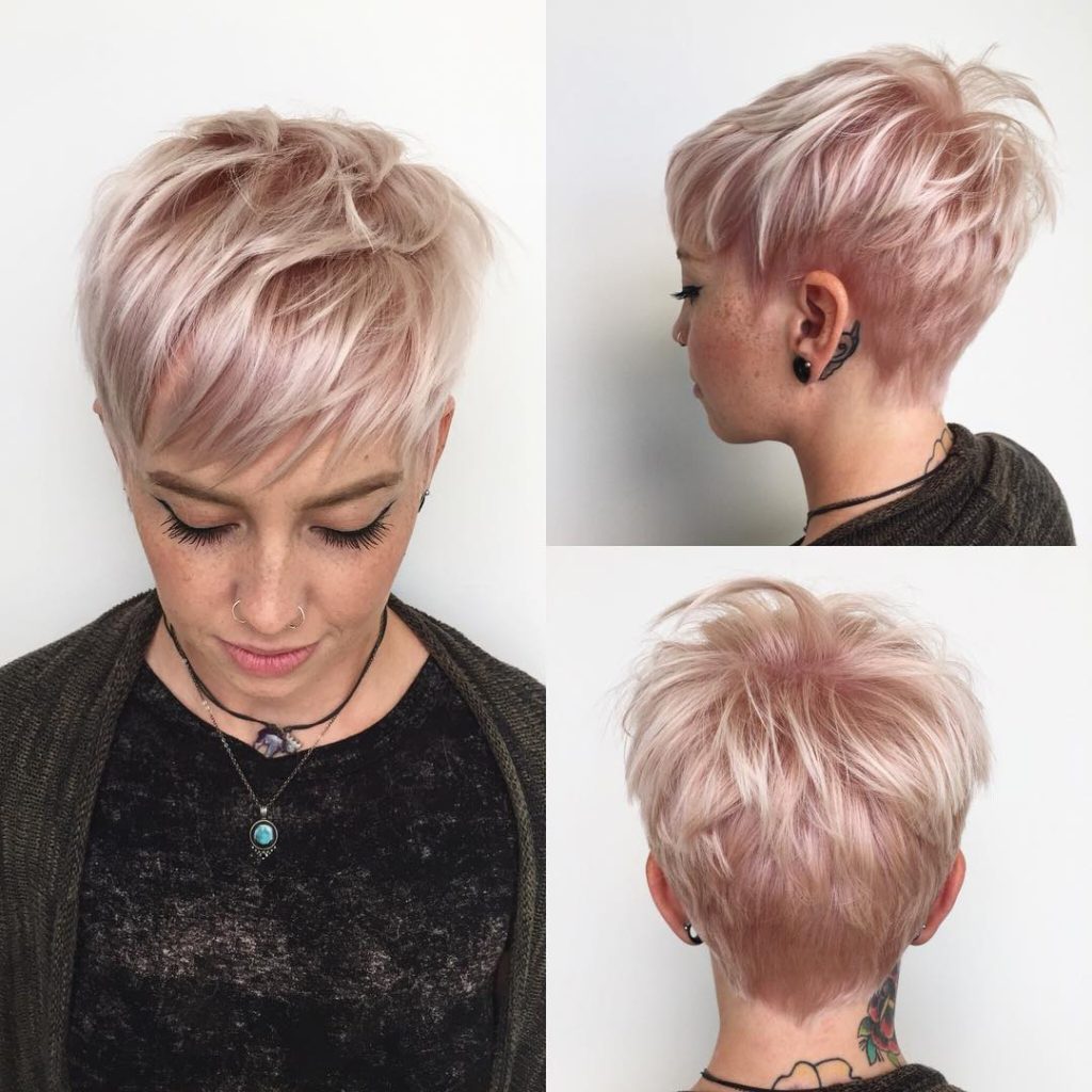 Messy Platinum Textured Pixie with Fringe Bangs and Soft Pink Highlights Short Hairstyle