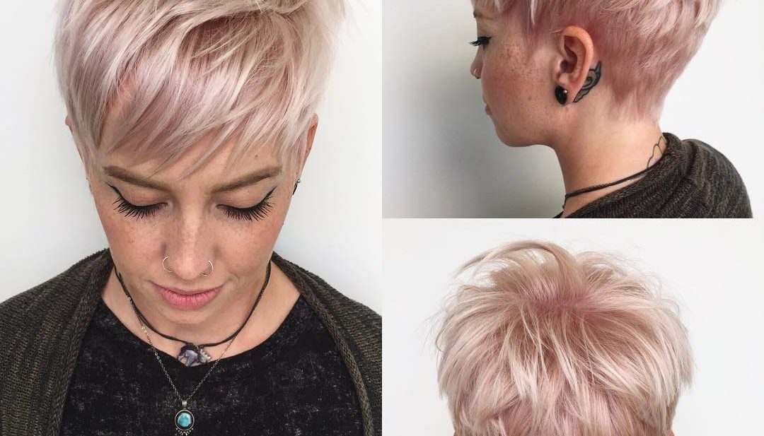 Messy Platinum Textured Pixie with Fringe Bangs and Soft Pink Highlights Short Hairstyle