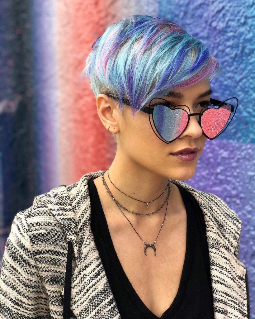 Messy Textured Layered Pixie with Side Swept Bangs and Pastel Rainbow Hand Painted Hair Color Short Summer Hairstyle