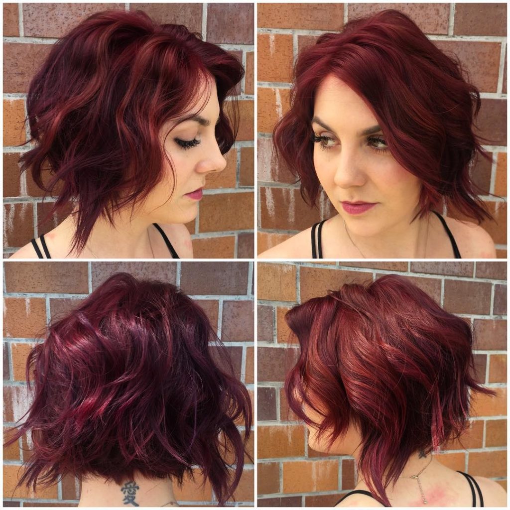 Messy Waves on Angled Textured Bob with Face Framing Layers and Vivid Burgundy Color Short Hairstyle