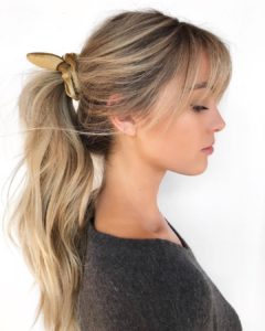 Messy Wavy Ponytail using Velvet Scrunchie with Fringe and Hand Painted Blonde Color Long Fall Updo Hairstyle