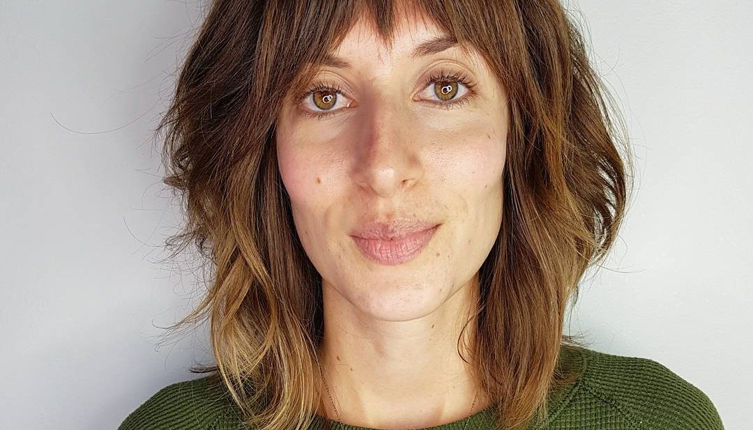 Modern Soft Wavy Shag Cut with Fringe Bangs and Sun Kissed Caramel Color Medium Length Hairstyle