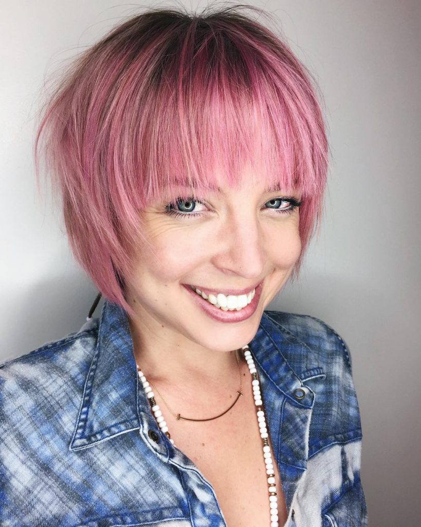 Pink Shaggy Bob with Feathered Bangs and Shadow Roots Short Hairstyle