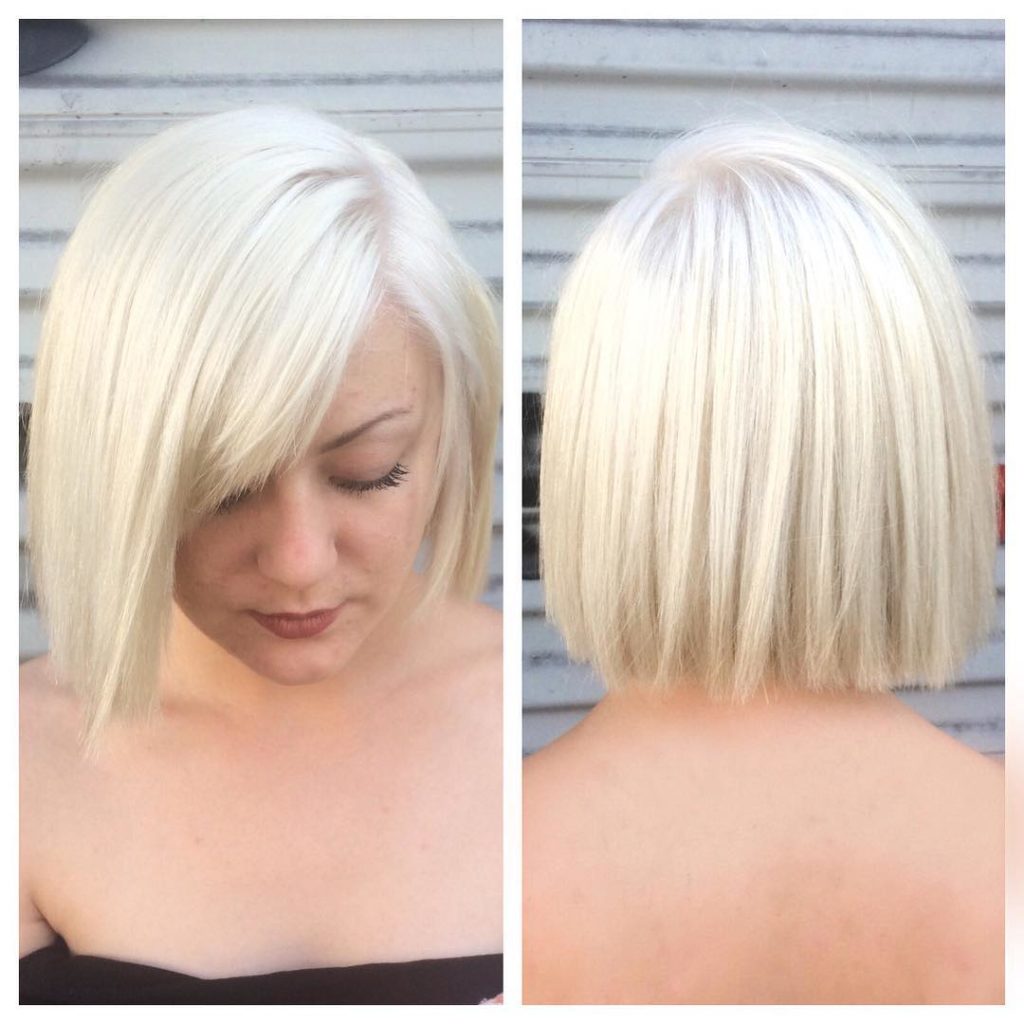 Platinum Blunt Cut Bob with Textured Ends and Side Swept Bangs Short Hairstyle
