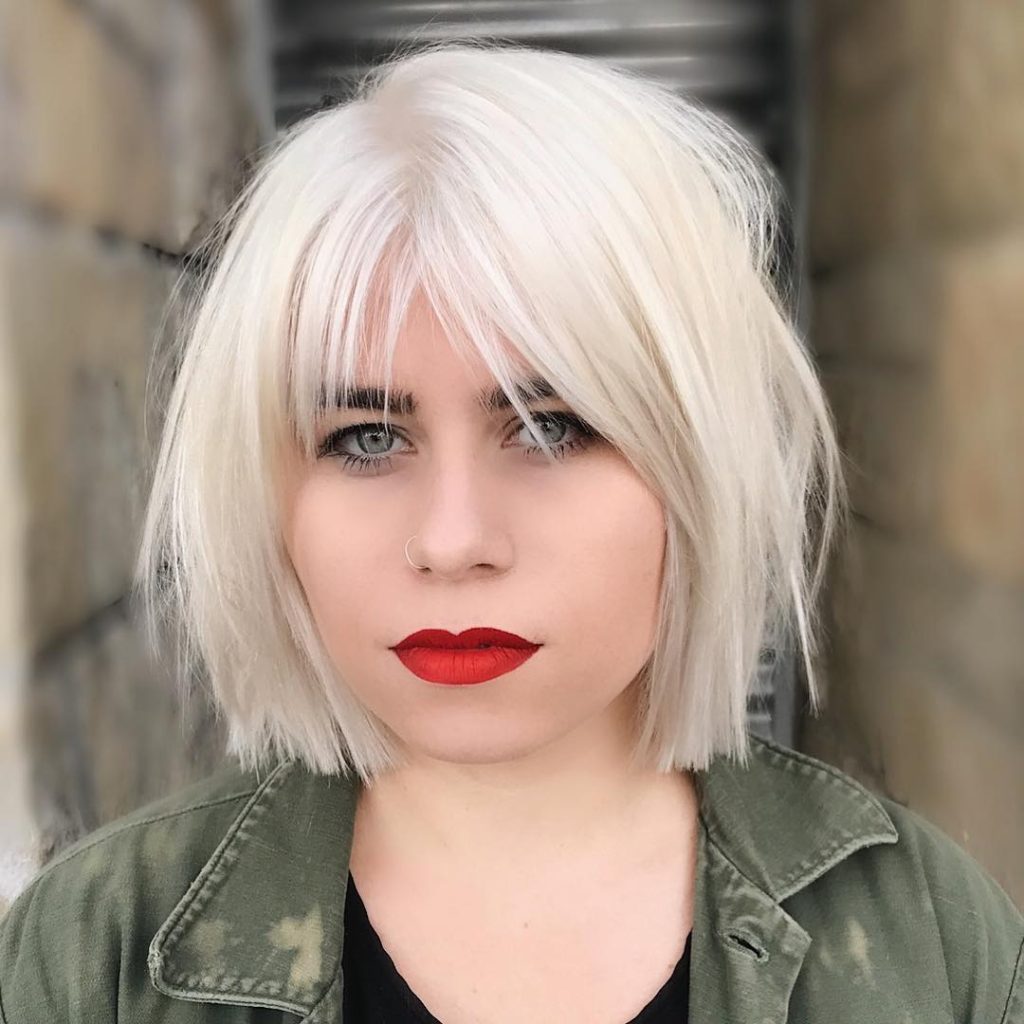 Platinum Choppy Bob with Parted Fringe Bangs and Undone Straight Texture Medium Length Hairstyle