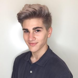 Platinum Undercut with Undone Brushed-Up Lengths and Grey Shadow Roots