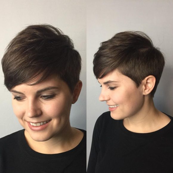 Polished Tapered Pixie with Voluminous Texture and Side Swept Bangs on Brunette Hair Short Hairstyle
