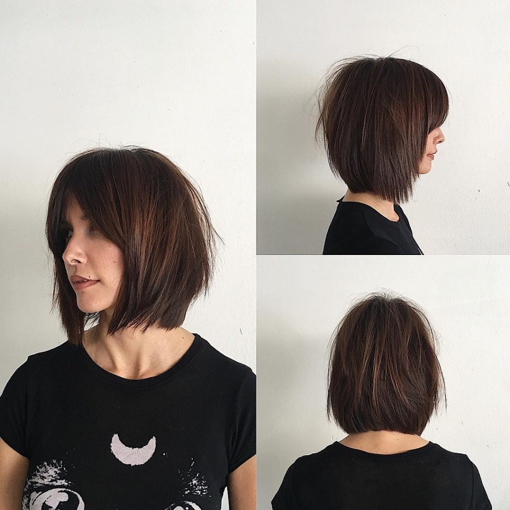 Rich Brunette Soft Layered Bob with Curtain Bangs and Undone Straight Texture Medium Length Hairstyle