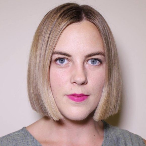 Sleek Blunt Bob with Blonde Color and Subtle Highlights Medium Length Hairstyle