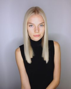 Sleek Blunt Cut with Center Part and Subtle Platinum Blonde Balayage Long Hairstyle