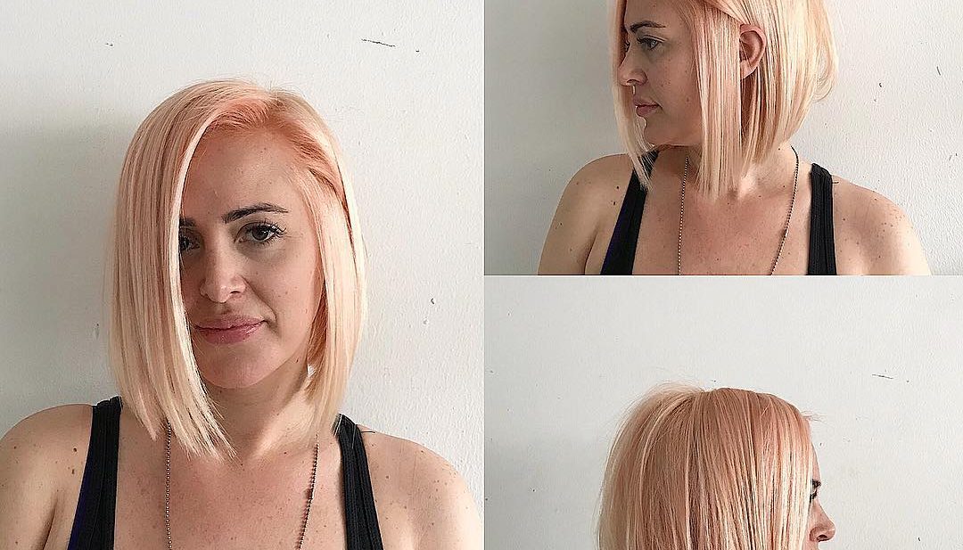 Sleek Bob with Clean Lines and Soft Rose Gold Blonde Color Medium Length Hairstyle