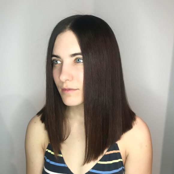 Sleek Brunette Lob with Sharp Blunt Angle and Center Part Medium Length Hairstyle