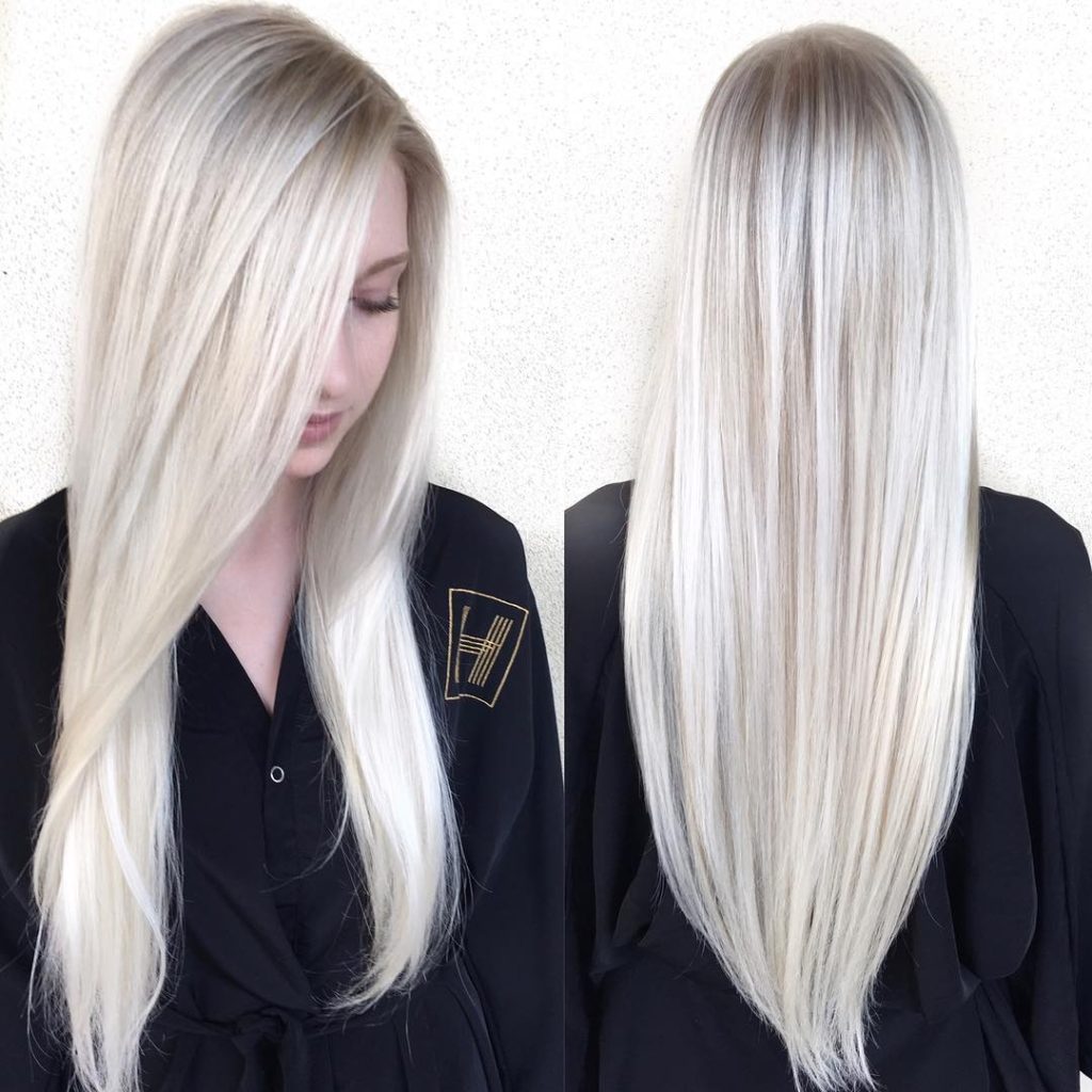 Sleek Platinum Blonde Hair with Side Part and V-Cut Layers Long Hairstyle